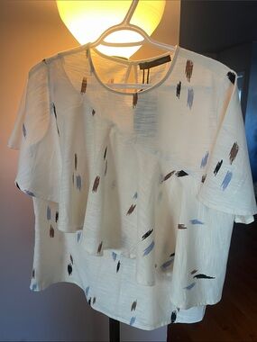 ParoryCream Short-Sleeve Ruffle Blouse with Abstract Brushstroke Print